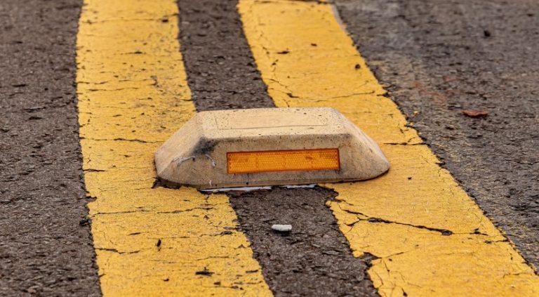 What Colour Are the Reflective Studs Between the Lanes on a Motorway